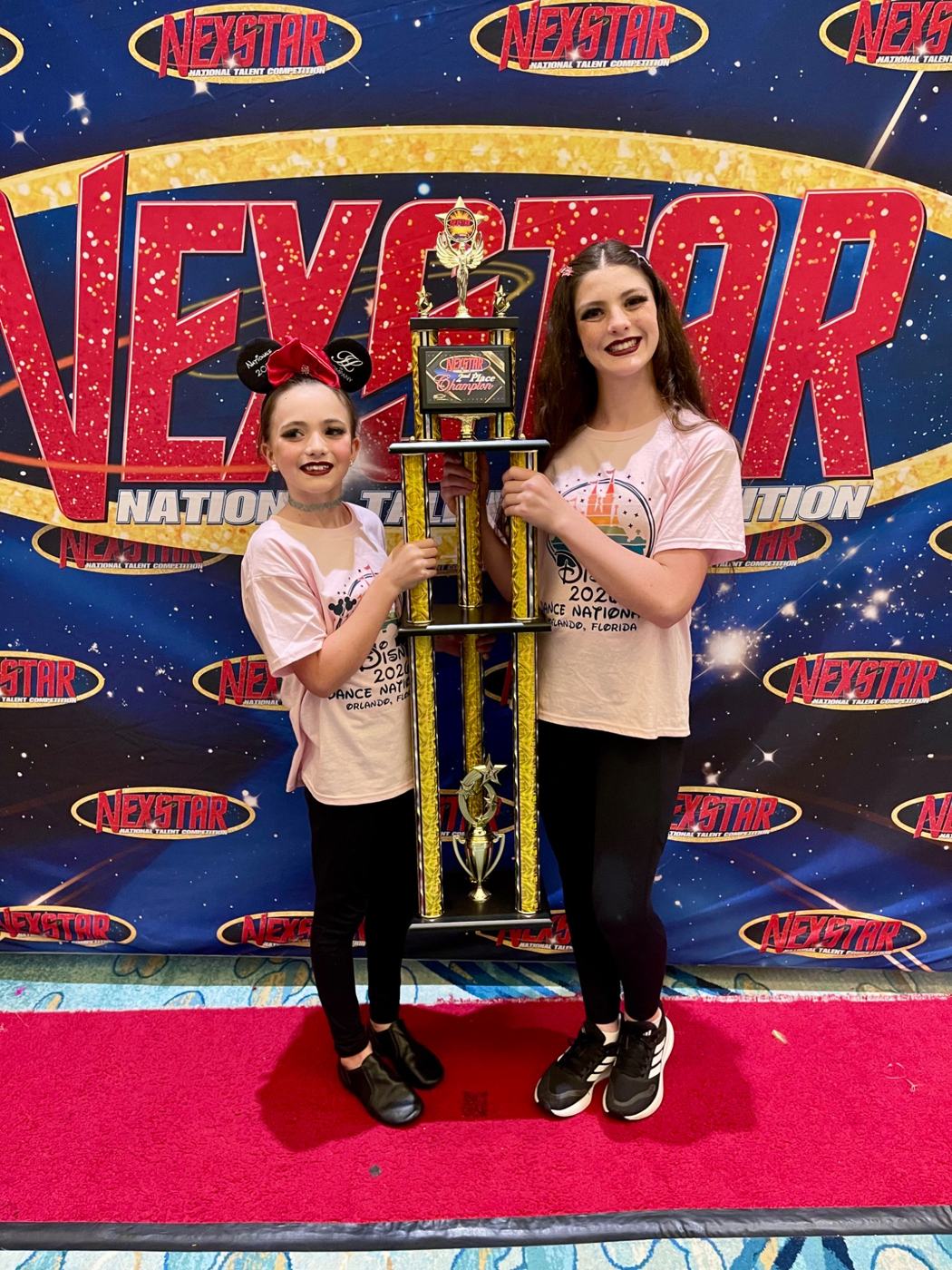 The girls with a competition trophy